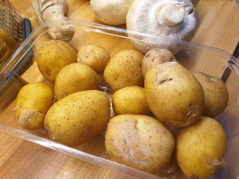 Potatoes Unpeeled in glass jar